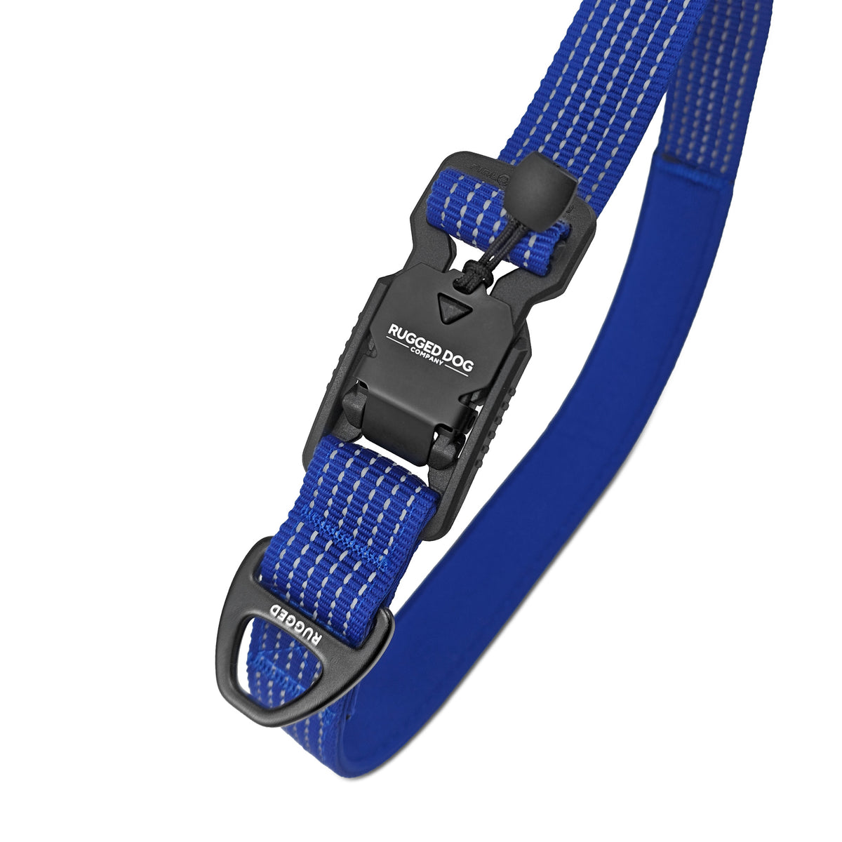Close-up of Navy Rugged Dog Company 3-in-1 dog leash showing 500-lb break-strength magnetic FIDLOCK V-Buckle for hand-loop, waist and crossbody conversion, accessory D-ring for poop bags or a water bottle, 900-lb-rated polyester webbing and high-visibility reflective stitching