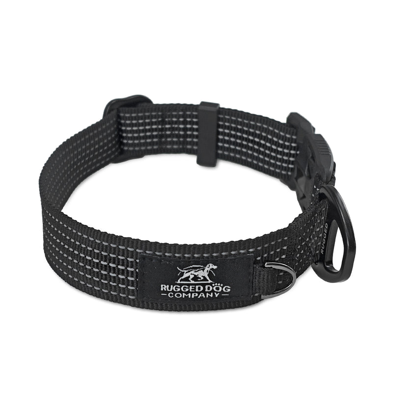 Black Rugged Dog Company magnetic dog collar showing branded logo patch, mini D-ring for dog tags and high-visibility reflective stitching