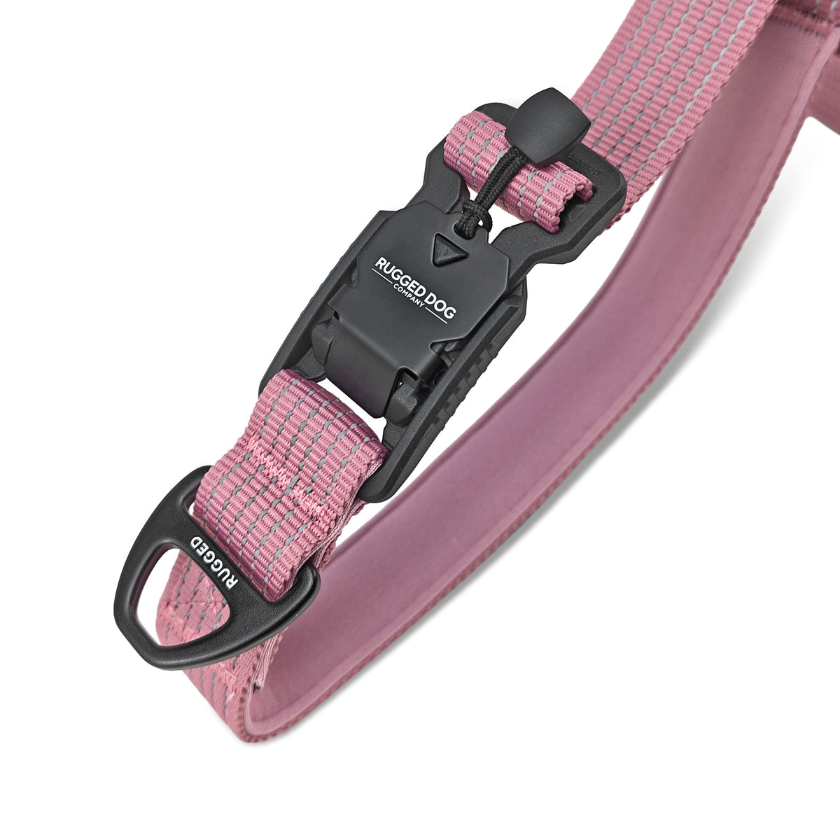 Close-up of Dusty Rose Rugged Dog Company 3-in-1 dog leash showing 500-lb break-strength magnetic FIDLOCK V-Buckle for hand-loop, waist and crossbody conversion, accessory D-ring for poop bags or a water bottle, 900-lb-rated polyester webbing and high-visibility reflective stitching
