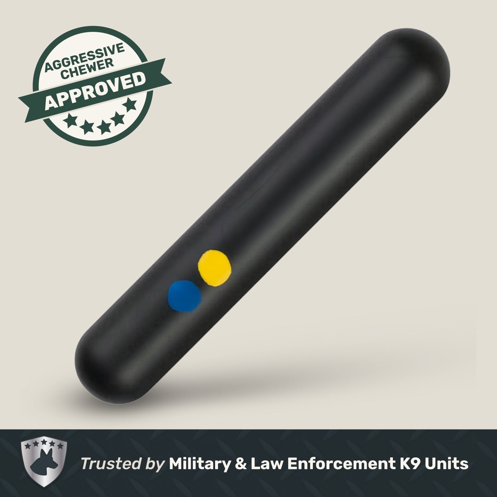 Black dog chew toy with colored indicators on a beige background, featuring an 'Aggressive Chewer Approved' label.